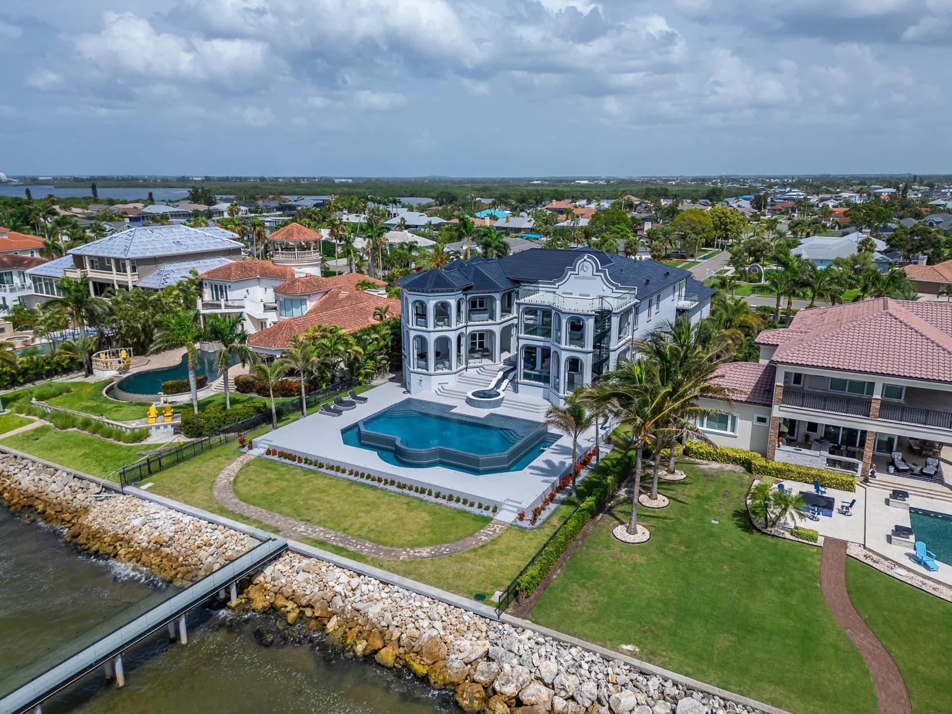 Waterfront estate, pool, and private dock on Tampa Bay