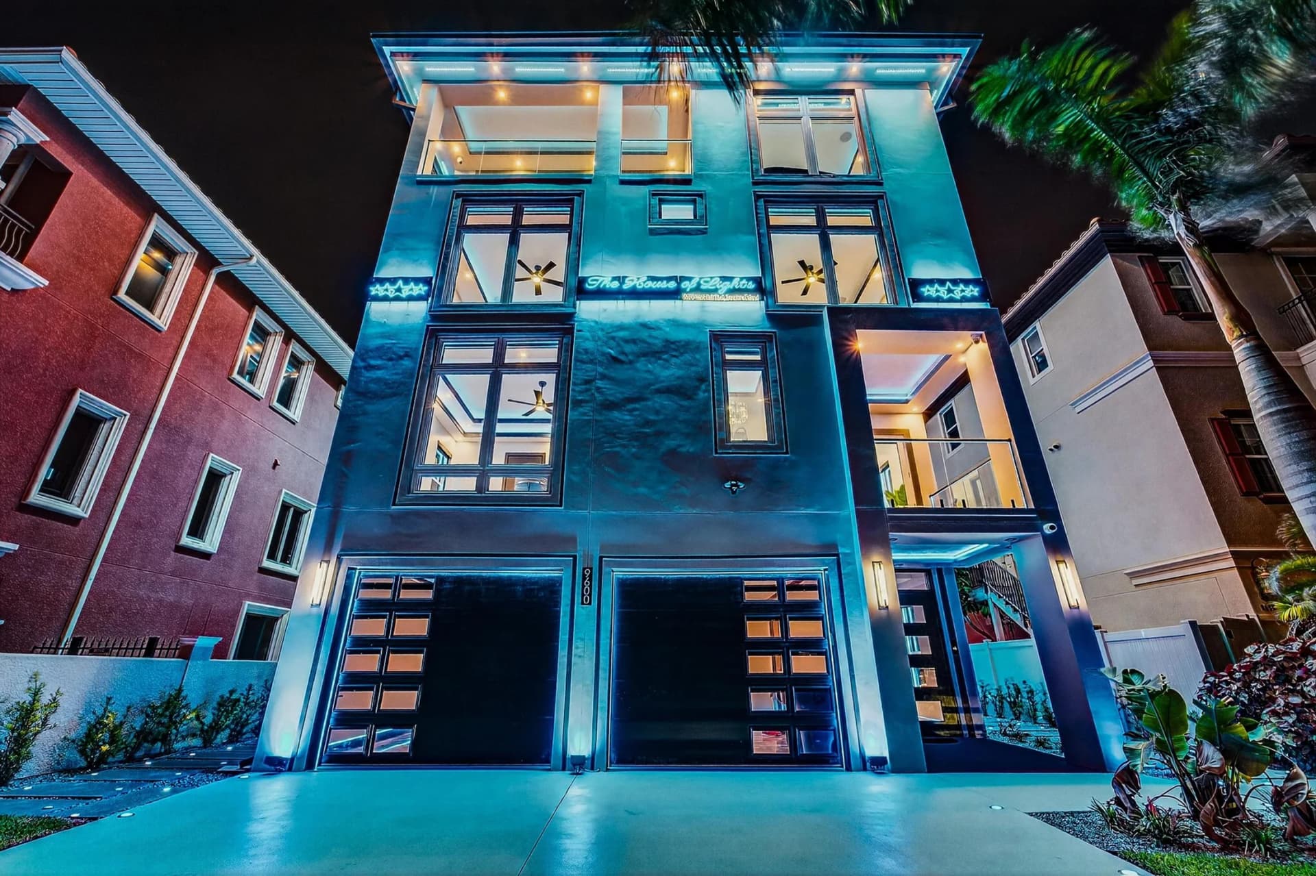 Beachfront home illuminated after dark