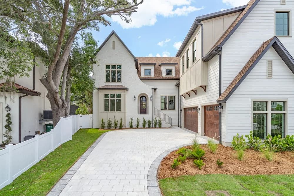 Lowell Avenue custom home and landscaped approach