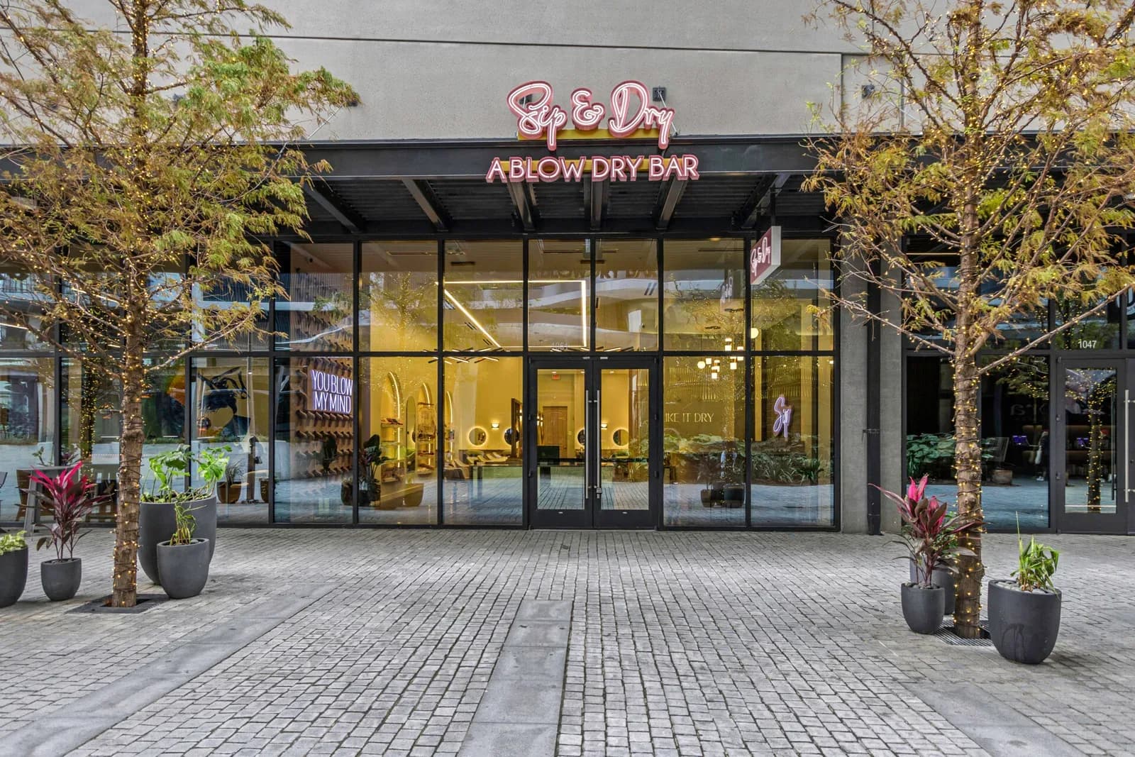 Completed Sip & Dry Blowbar storefront in Tampa's Water Street district